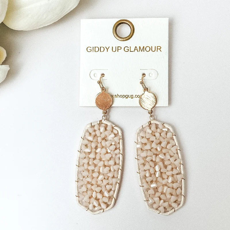 Moon charm earrings-Ivory Crystal Drop Earrings with Gold Tone Accents