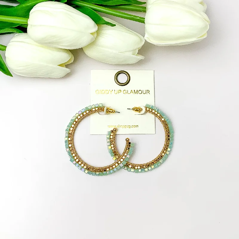 Owl wing earrings-Gold Tone Beaded Hoop Earrings with a Mint Crystal Outline