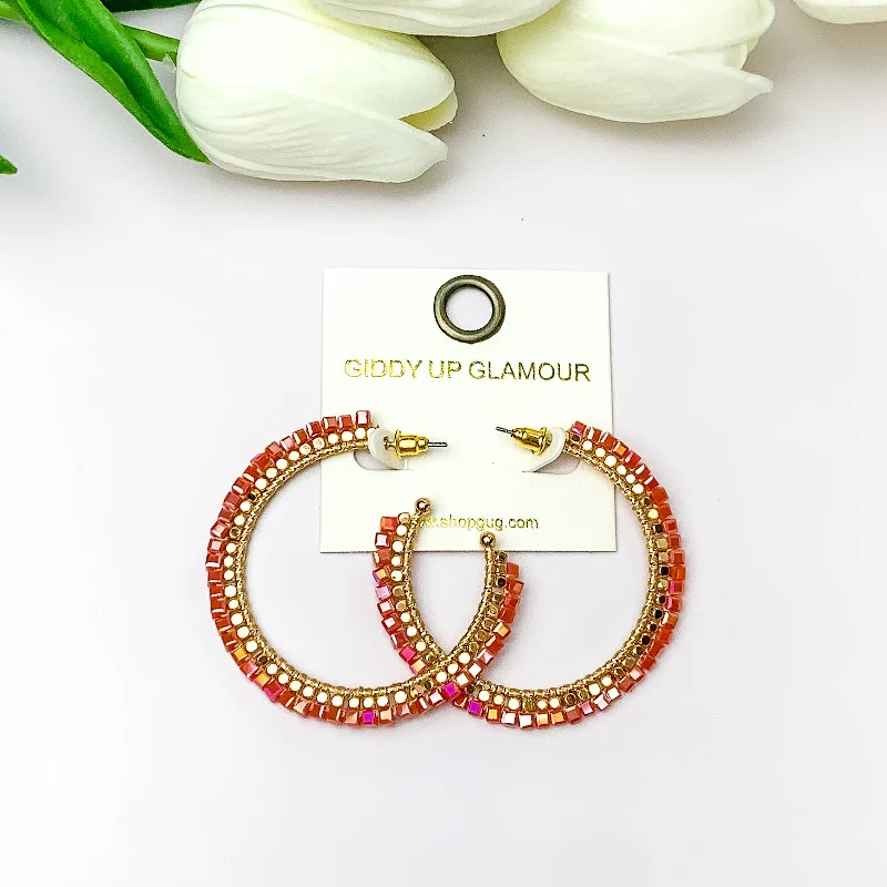 Topaz gem earrings-Gold Tone Beaded Hoop Earrings with a Red Orange Crystal Outline