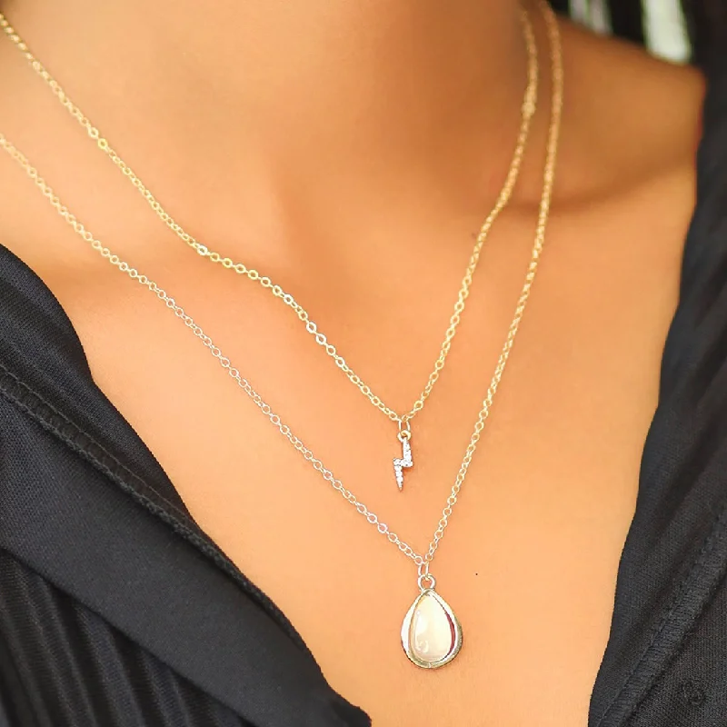 Plated silver necklaces-Contemporary Diamante Studded Lightning & Moonstone Teardrop Pendant Gold-Toned Multi-Layered Necklace