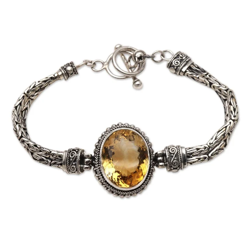 Bow knot bangles-NOVICA Endless Facets, Citrine pendant bracelet