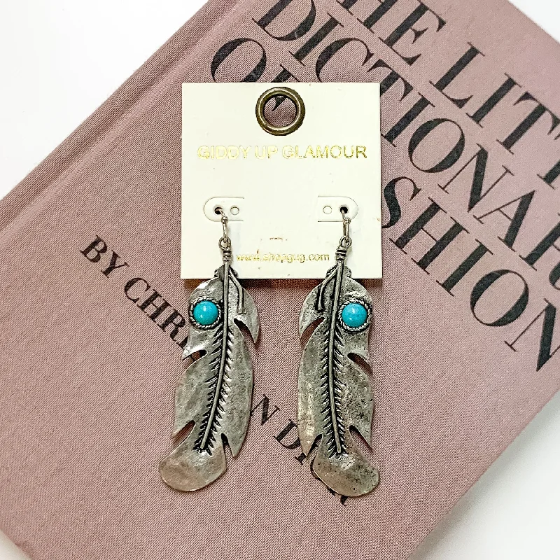 Vine pattern earrings-Silver Tone Feather Drop Earrings with Turquoise Blue Stones