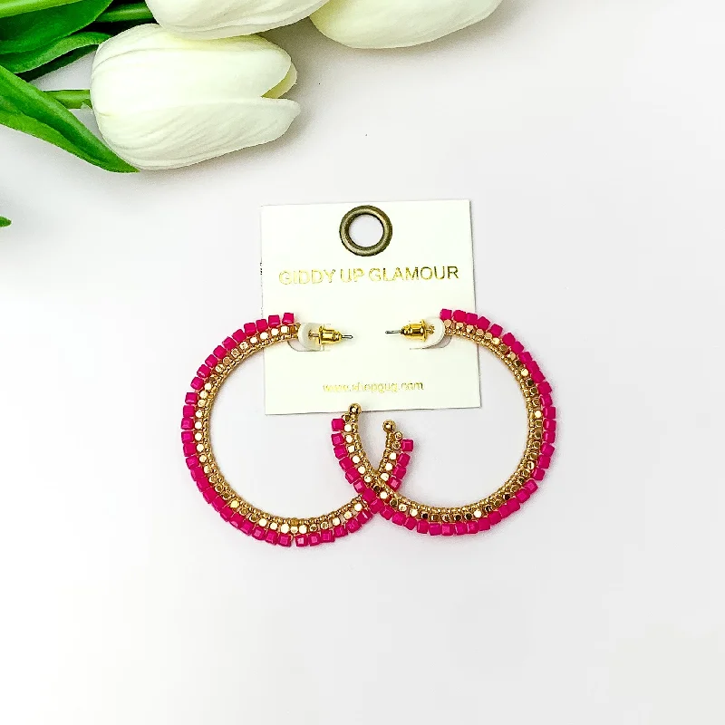 Subtle drop earrings-Gold Tone Beaded Hoop Earrings with a Hot Pink Crystal Outline