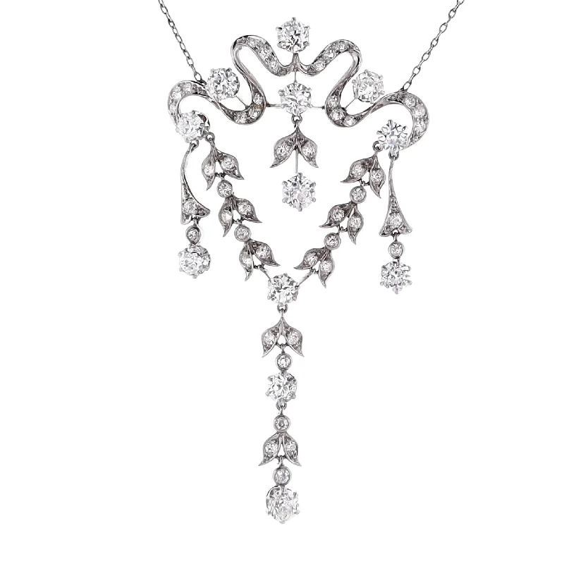 Cosmic charm necklaces-Estate Platinum Freeform Ribbon/Flower Design Diamond Necklace