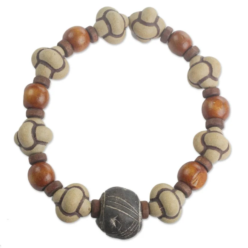 Regency style bangles-NOVICA Bold Adventurer, Men's terracotta and wood beaded stretch bracelet