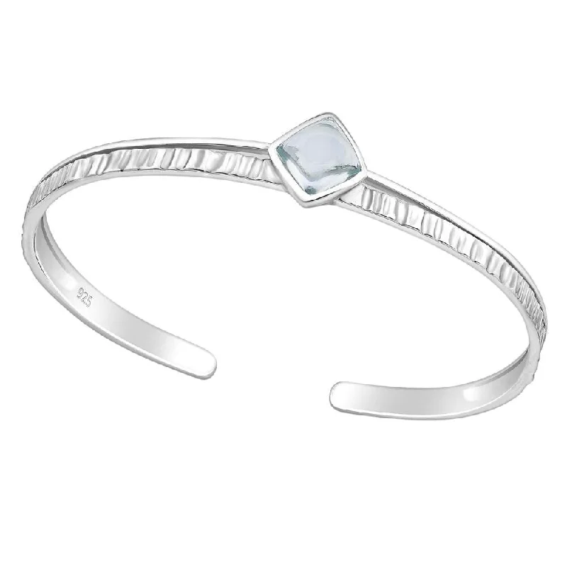 Stretch thread bangles-Sterling Silver Textured Cuff Bracelet with Sky Blue Topaz