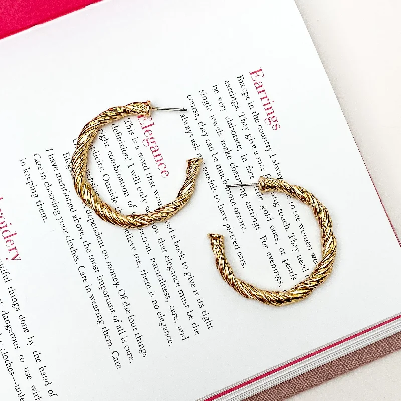 Sleek art earrings-Anything Goes Twisted Medium Hoop Earrings in Gold Tone