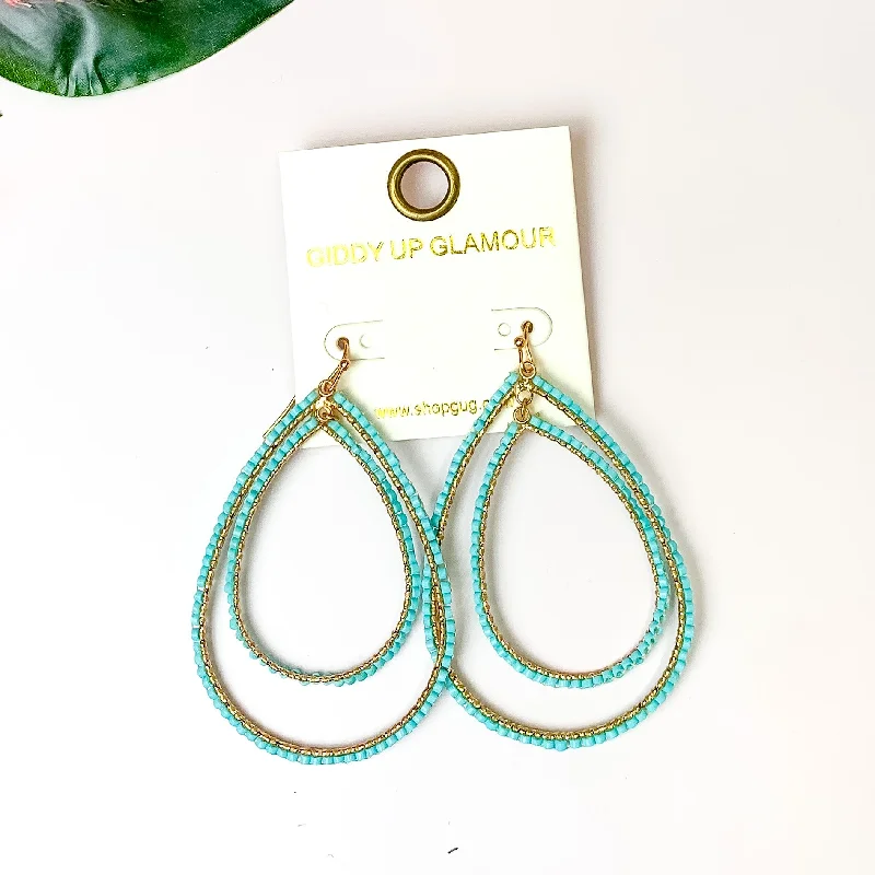 Bamboo style earrings-Double Open Teardrop Gold Tone Earrings with Beaded Outline in Turquoise Blue