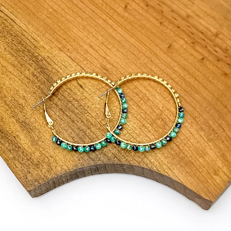 Thick bar earrings-Gold Tone Hoop Earrings Wrapped in Clear and Blue Crystals